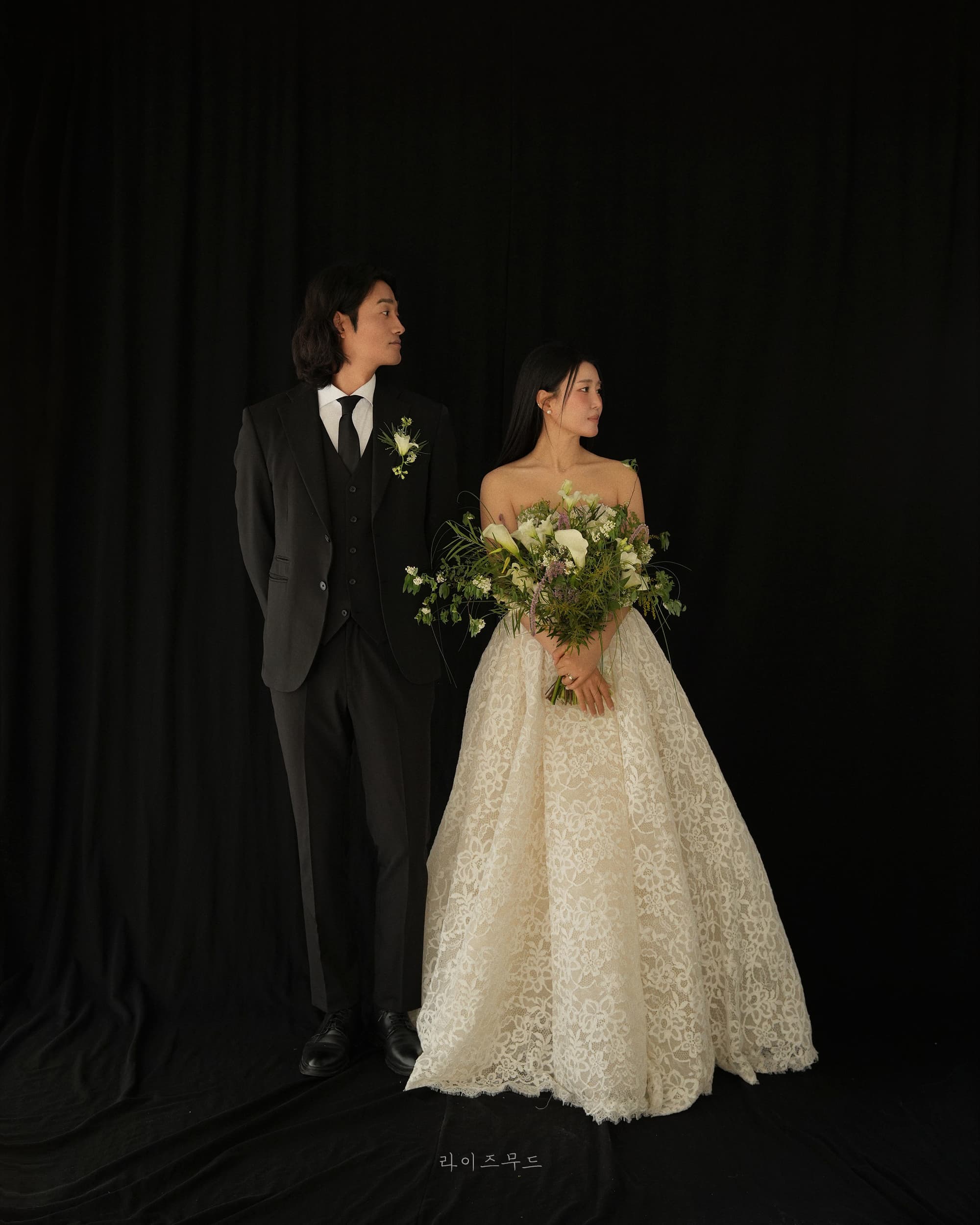 Bride and groom in an editorial studio portrait